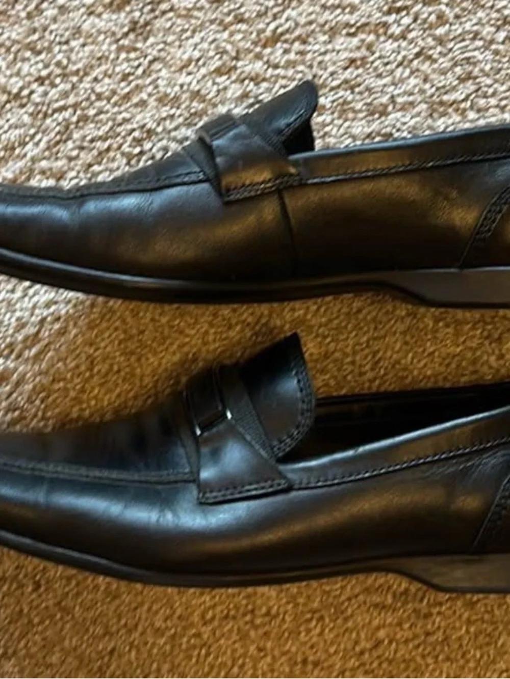 Calvin Klein Men’s Black Leather Slip-On Loafers with Metal Accent